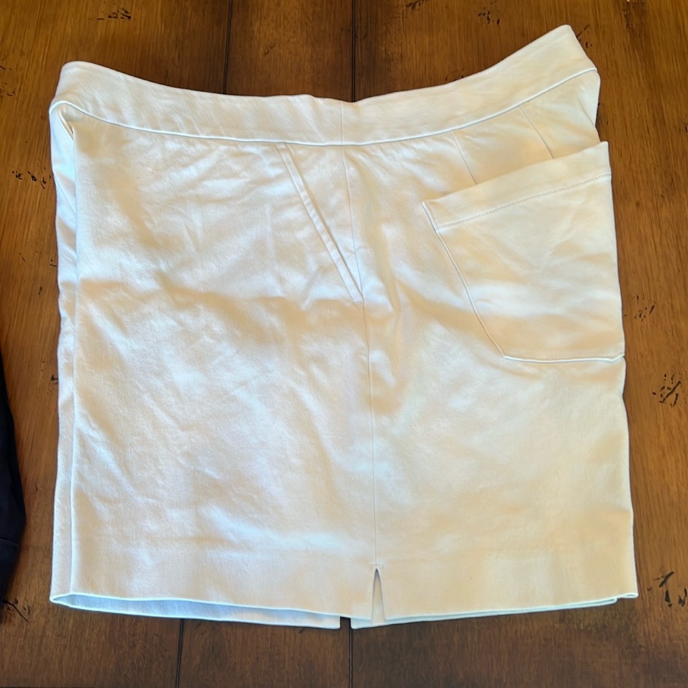 Two pair for price of one!!  Spanx white shorts NWOT and black shorts worn once